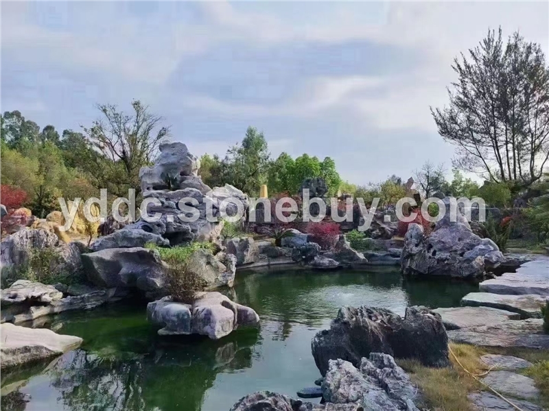 园林绿化太湖石墨石摆景石直销小溪流水石凳石桌