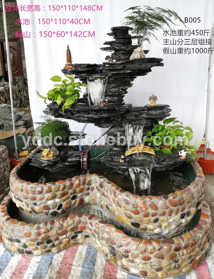 黑英石假山公园风景石片石叠山工程案例