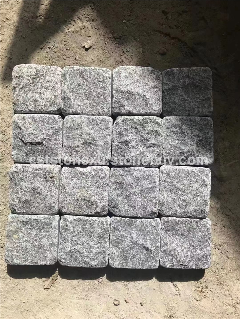 芝麻黑G654自然面滚磨弹石马蹄石