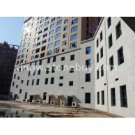 金点芝麻白-石家庄国际机场外墙干挂工地